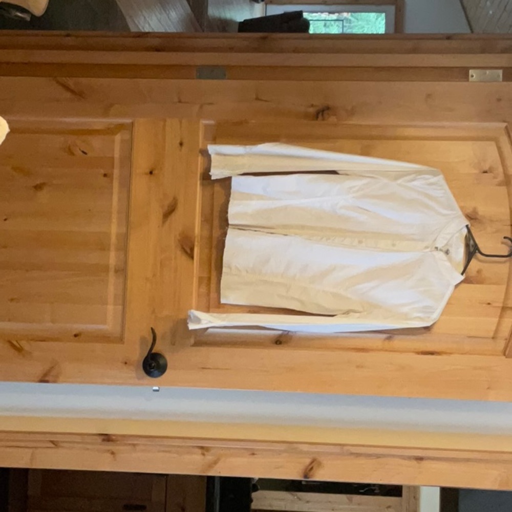 Prana button up blouse white with embroidery on front, back and cuffs.